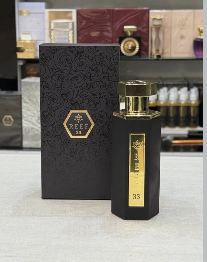 Reef perfume bottle in an elegant black and gold design